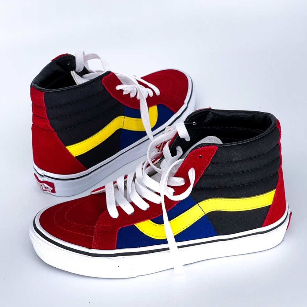 Multicolored high top vans.